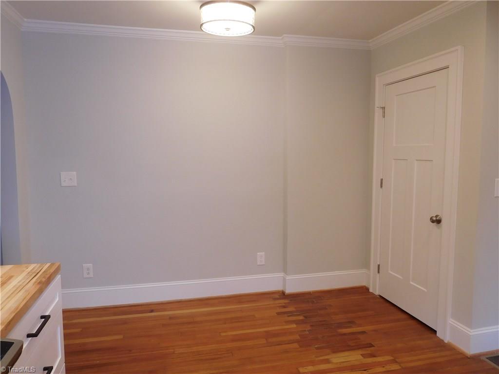 2402 Polo Road Winston-Salem, NC 27106 - Photo 15 of 30 Eat-in Space in this Kitchen and pantry for more storage.