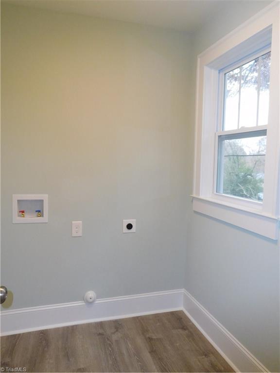 2402 Polo Road Winston-Salem, NC 27106 - Photo 17 of 30 Walk-in Laundry room w/all new vinyl plank floors.