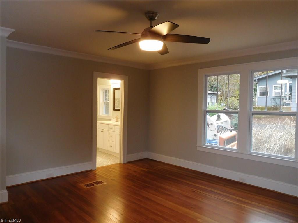 2402 Polo Road Winston-Salem, NC 27106 - Photo 18 of 30 Master Bedroom. Hardwoods continue. The Master has two closets.