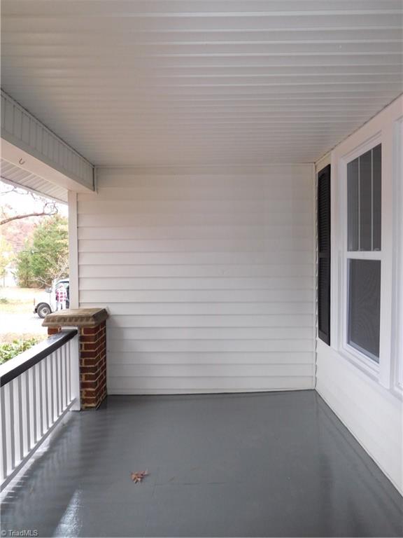 2402 Polo Road Winston-Salem, NC 27106 - Photo 27 of 30 Covered front porch. This would be great for rocking chairs or decorating.