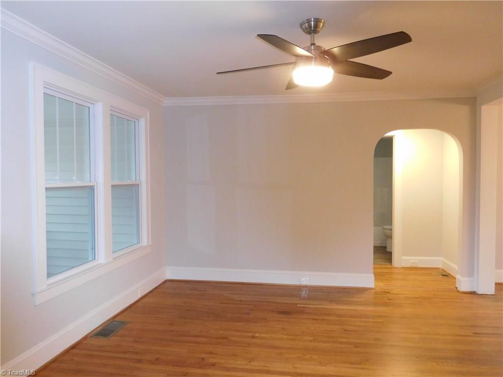 2402 Polo Road Winston-Salem, NC 27106 - Photo 4 of 30 Living Room. Three archways in home to give that 1920's feel but remodeled for 2019.