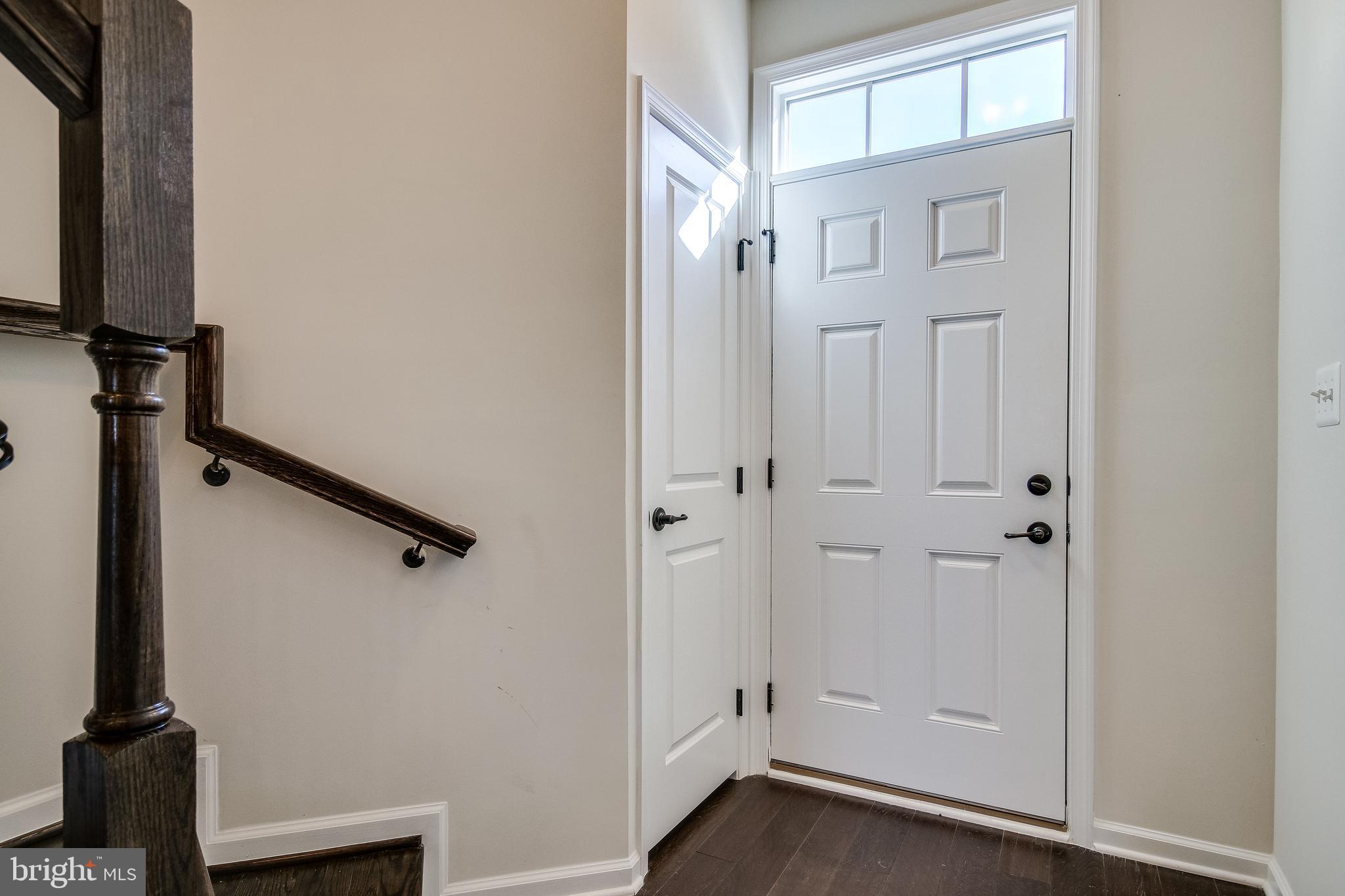 18068 Red Mulberry Road Dumfries, VA 22026 - Photo 2 of 40 Foyer, wood flooring throughout Main Level