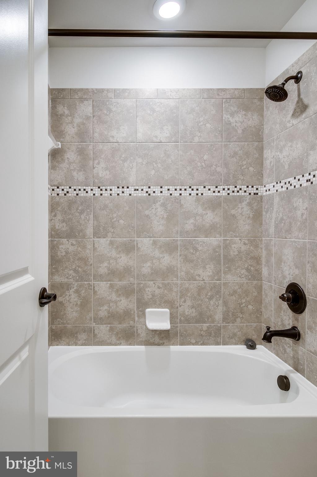 18068 Red Mulberry Road Dumfries, VA 22026 - Photo 22 of 40 upper level Hall Bath tub