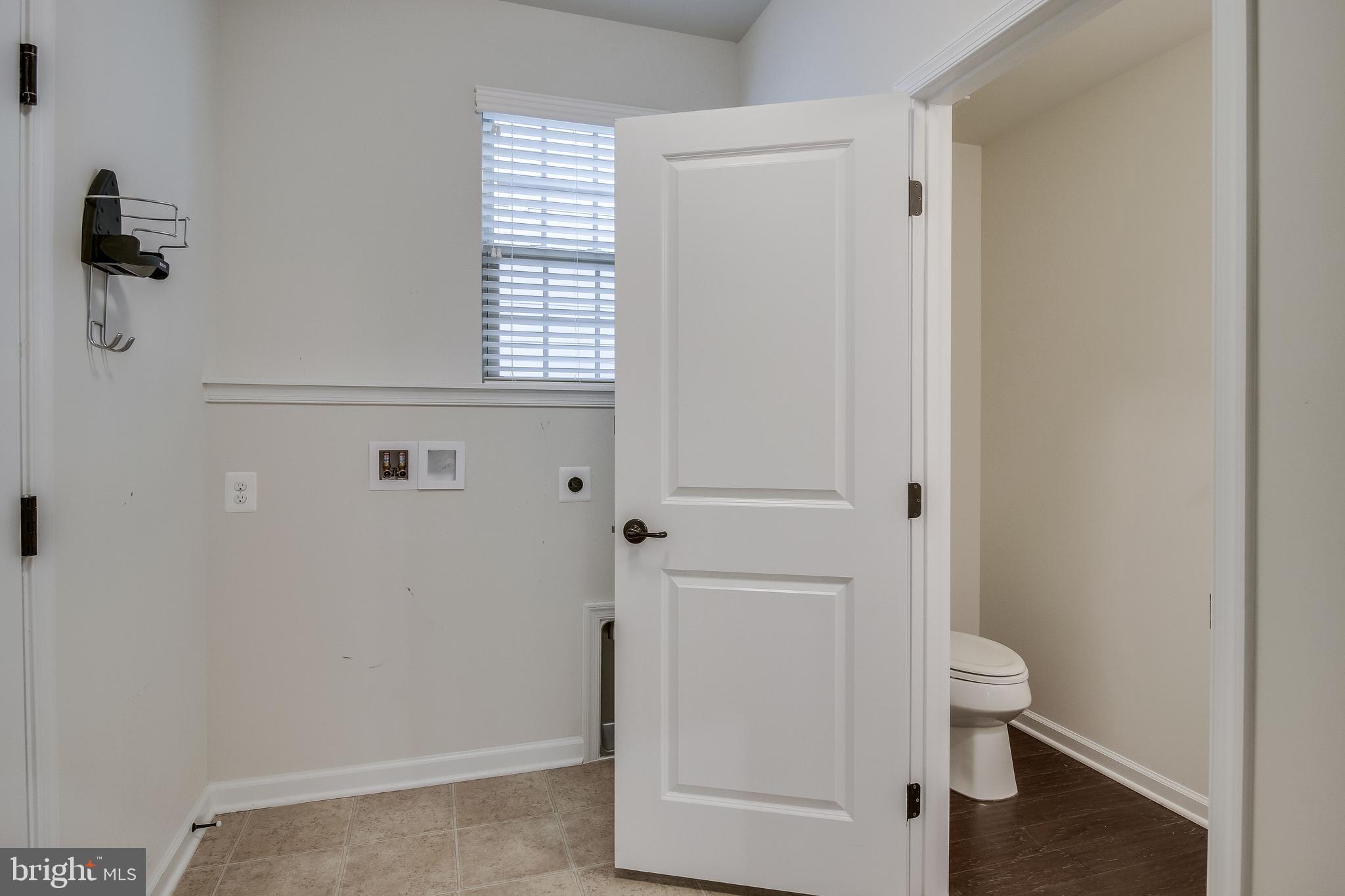 18068 Red Mulberry Road Dumfries, VA 22026 - Photo 25 of 40 Laundry Rm on Main level