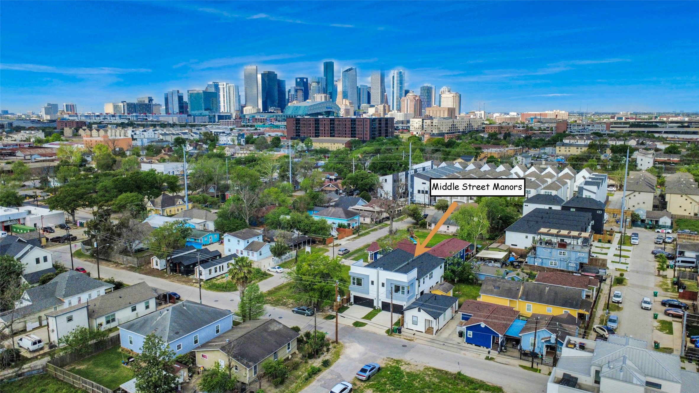 505 Middle Street Houston, TX 77003 - Photo 41 of 46 Discover Middle Street Manors, a charming neighborhood nestled amidst lush greenery with stunning city skyline views, blending urban convenience with serene suburban living.