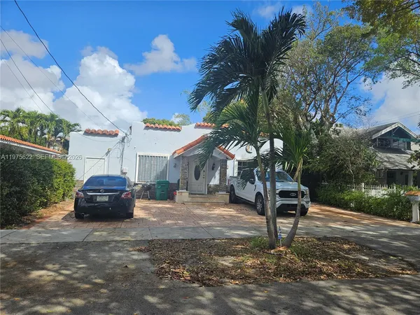 a car parked in front of a house
