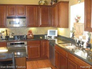 5222 Belmonte Drive, Unit 22 Rochester, MI 48306 - Photo 7 of 16 2ND KITCHEN VIEW