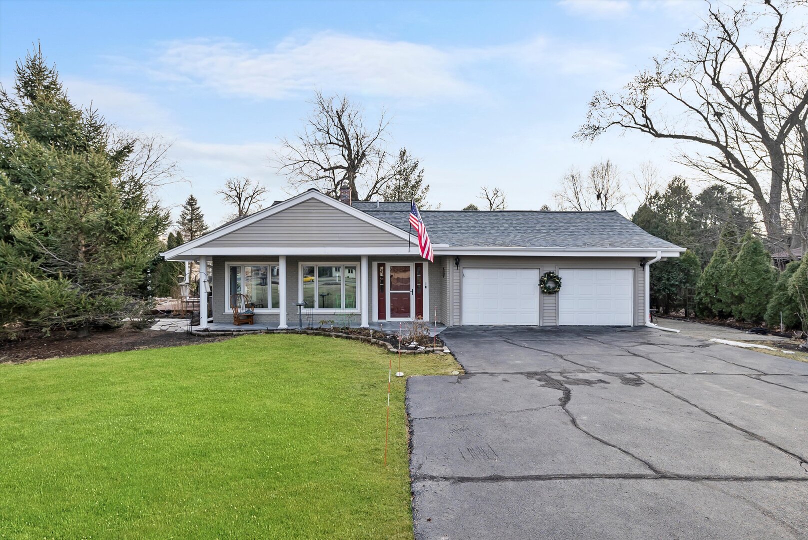 front view of a house with a yard