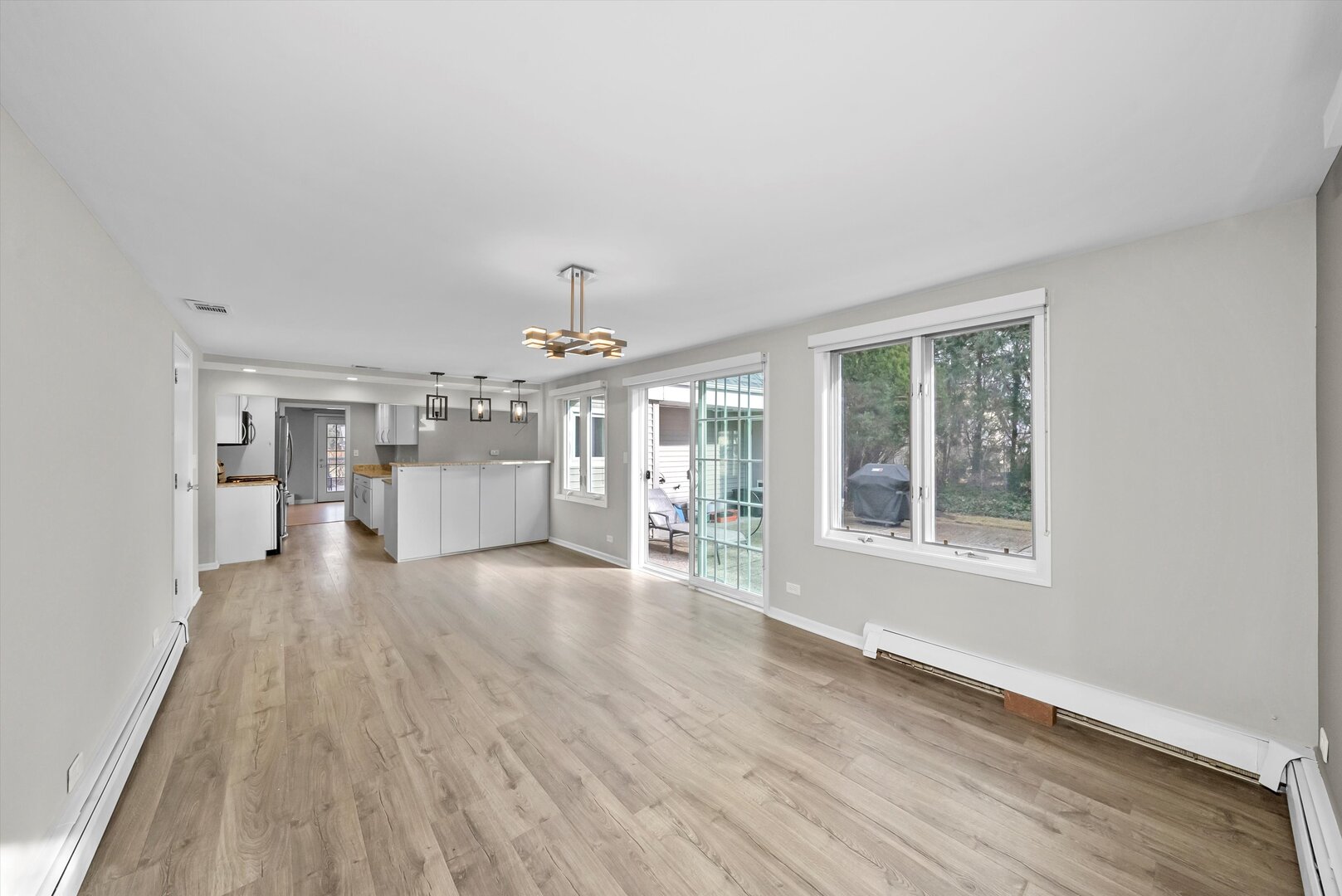 452 Deerpath Road Wood Dale, IL 60191 - Photo 24 of 50 a view of an empty room with wooden floor and a window