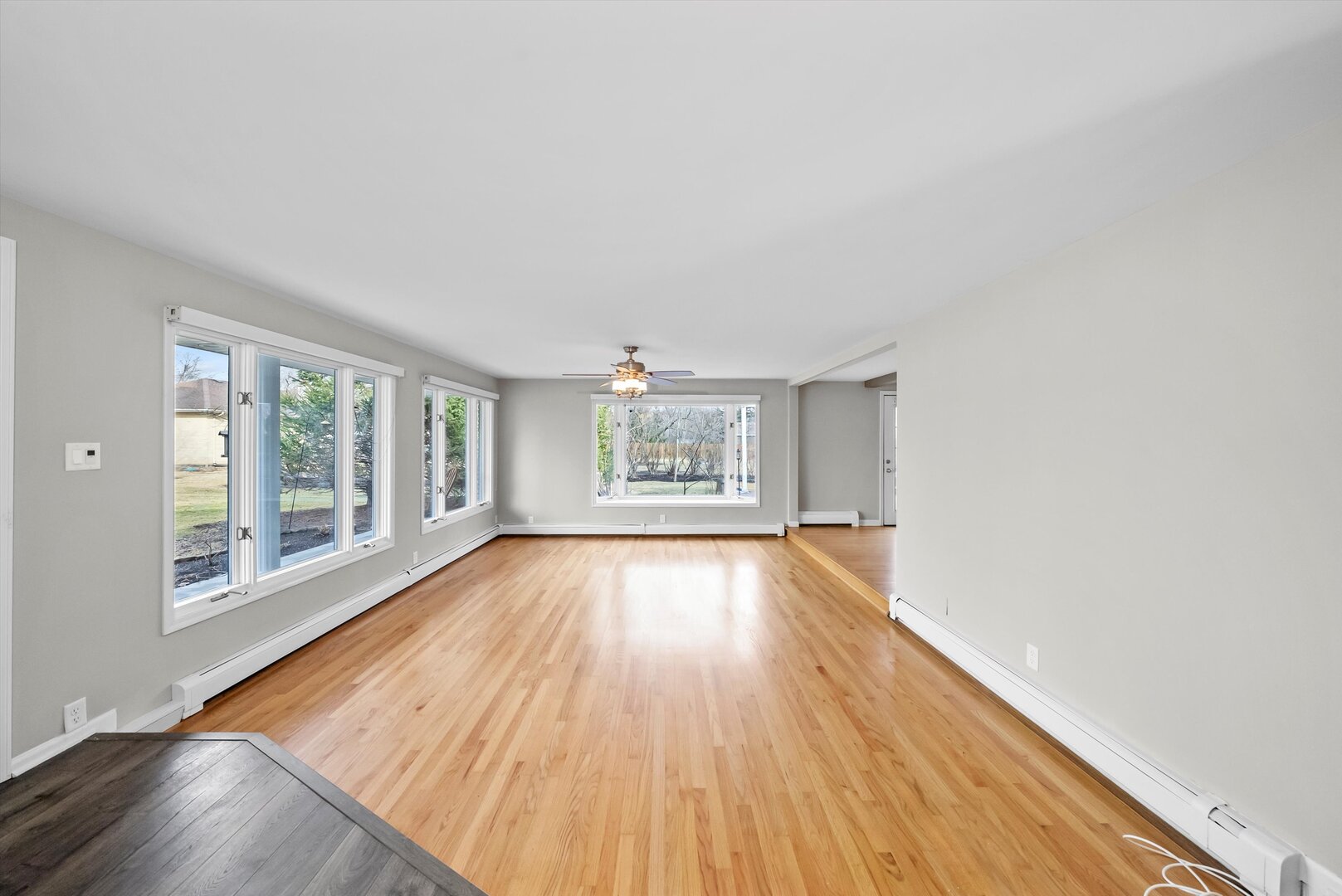 452 Deerpath Road Wood Dale, IL 60191 - Photo 5 of 50 wooden floor in an empty room with a window