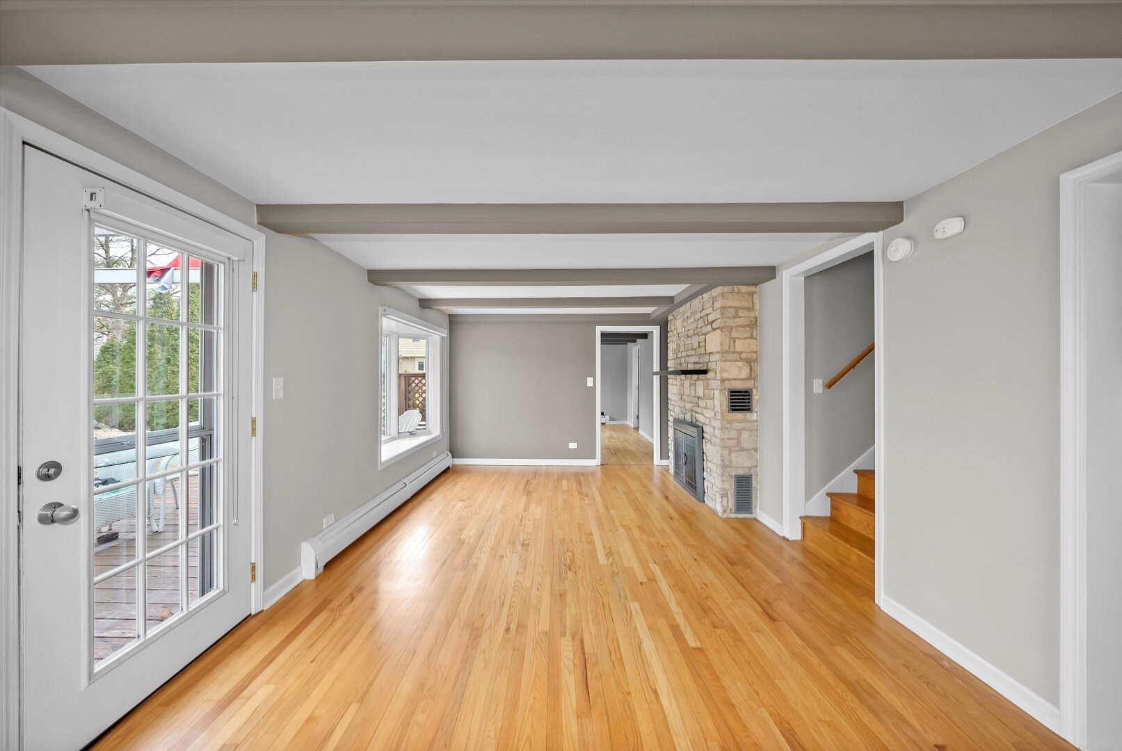 452 Deerpath Road Wood Dale, IL 60191 - Photo 10 of 50 a view of a big room with wooden floor and windows