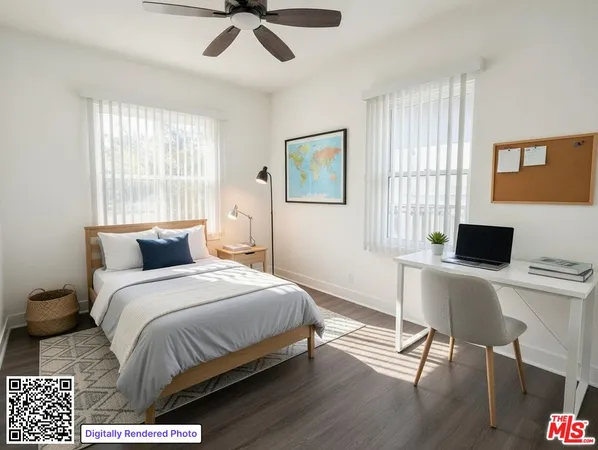 a bedroom with a bed and a desk