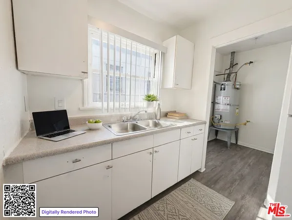 a bathroom with a double vanity sink a mirror and a bathtub