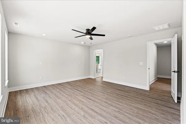 a view of an empty walk in closet