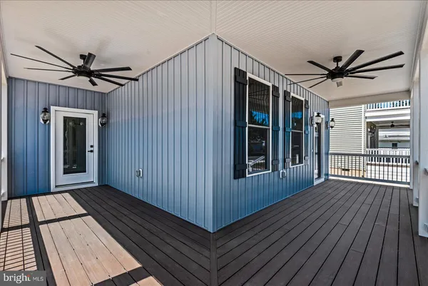 a view of kitchen with wooden floor and window
