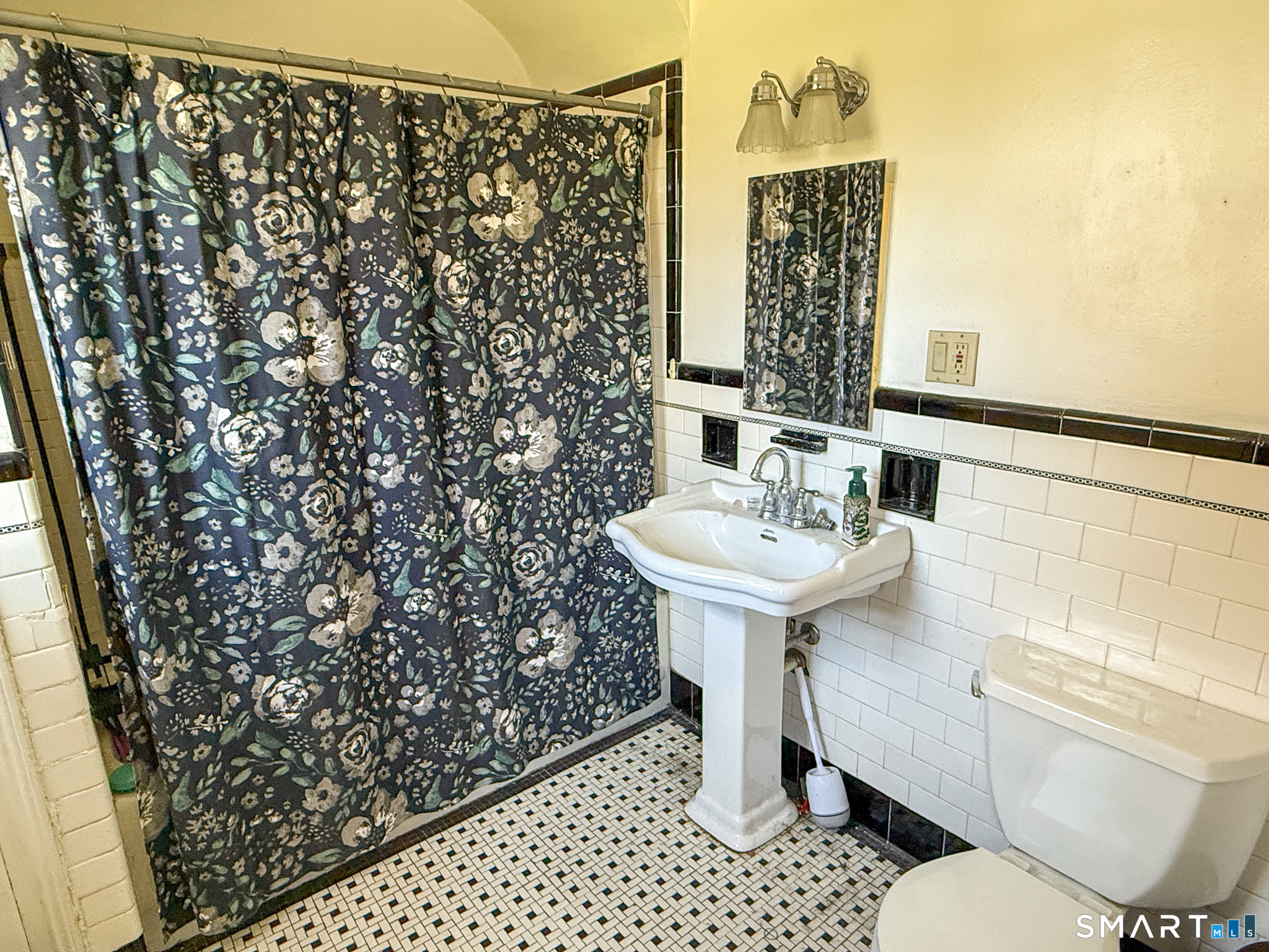64 Hoffman Street Torrington, CT 06790 - Photo 13 of 27 a bathroom with a sink toilet and shower