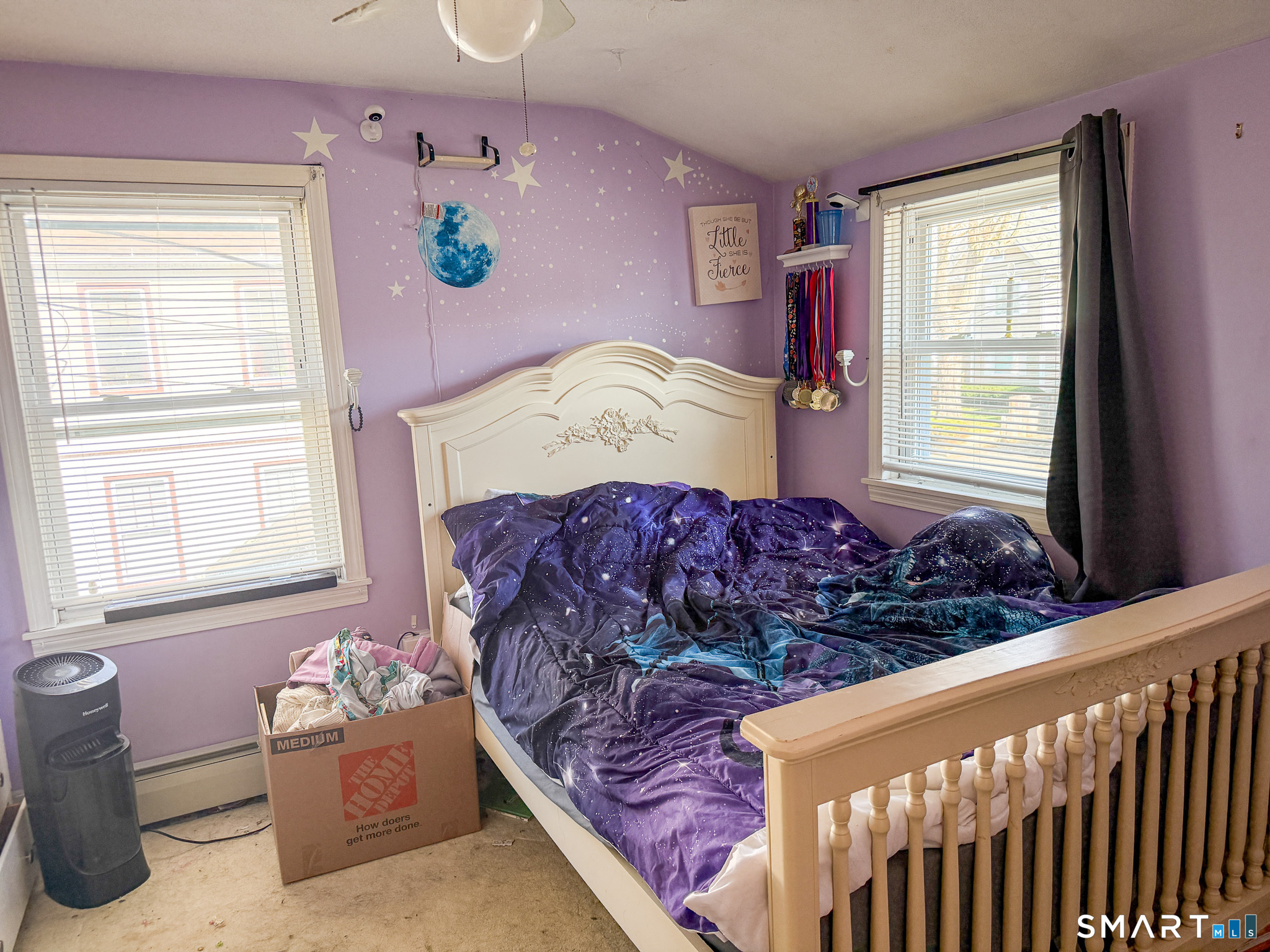 64 Hoffman Street Torrington, CT 06790 - Photo 15 of 27 a bed sitting in a bedroom next to a window