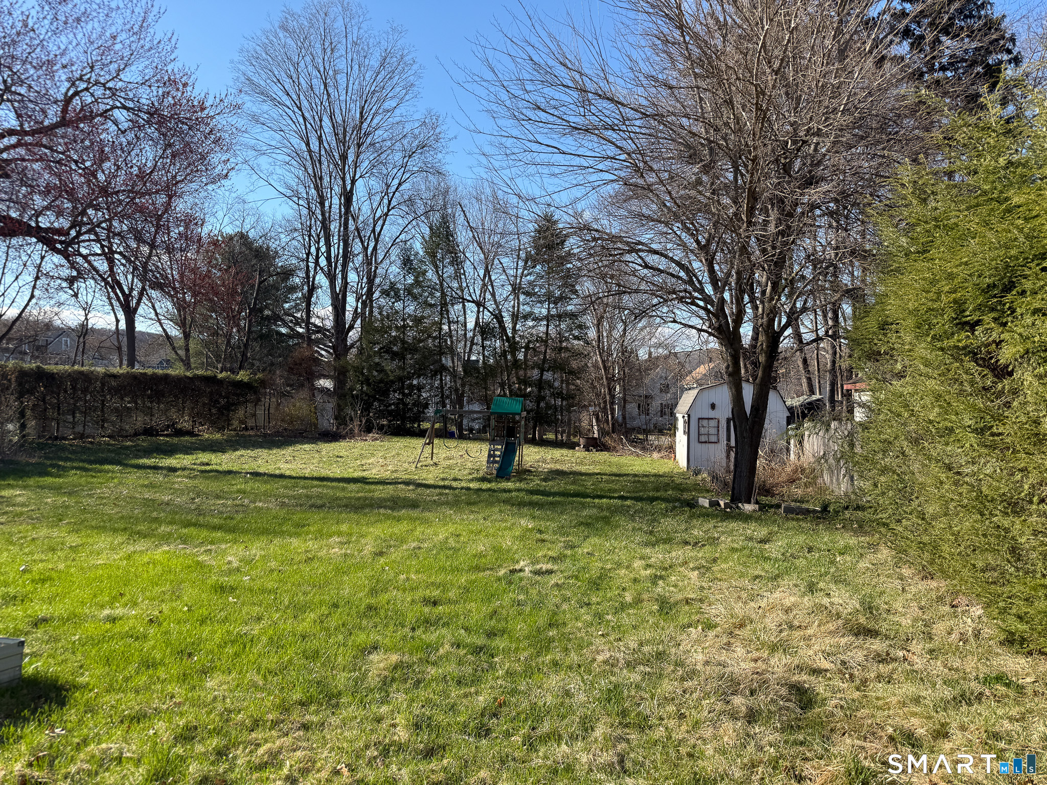 64 Hoffman Street Torrington, CT 06790 - Photo 26 of 27 a view of backyard with green space