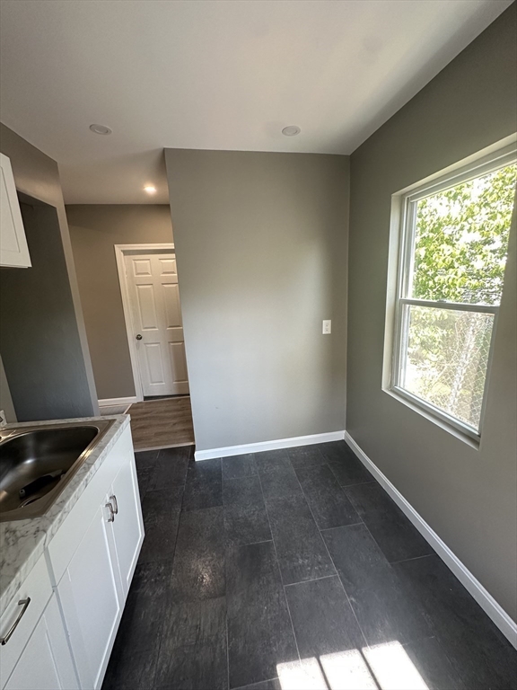 531 Revere Street, Unit 4 Revere, MA 02151 - Photo 2 of 10 a view of an empty room and window