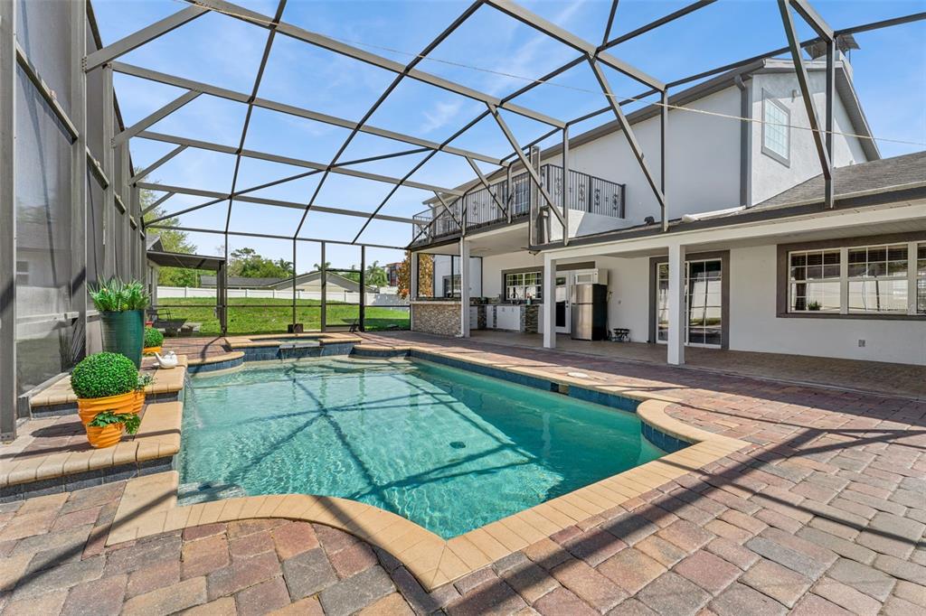 6053 New Hope Road Orlando, FL 32824 - Photo 29 of 40 a view of a swimming pool with a patio