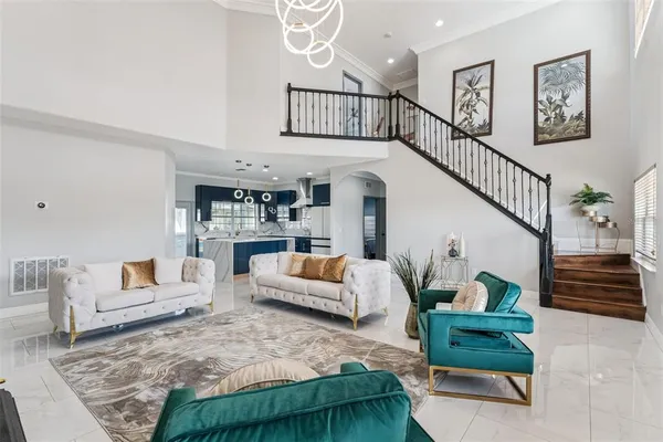 a living room with furniture and a rug