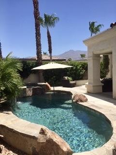 80777 Calle Azul La Quinta, CA 92253 - Photo 2 of 39 a view of a backyard with a garden and plants
