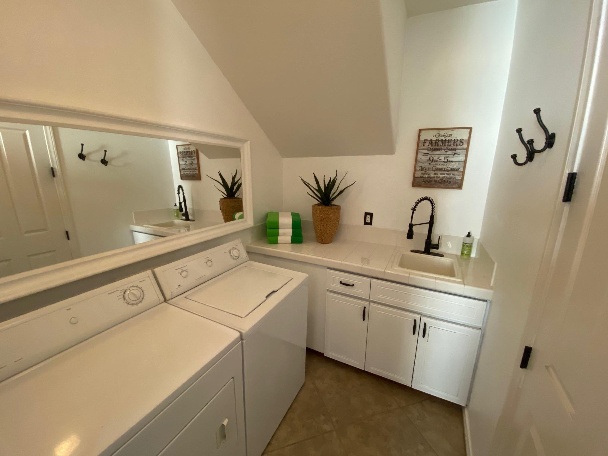 80777 Calle Azul La Quinta, CA 92253 - Photo 14 of 39 a view of a bathroom with 2 sink and a mirror