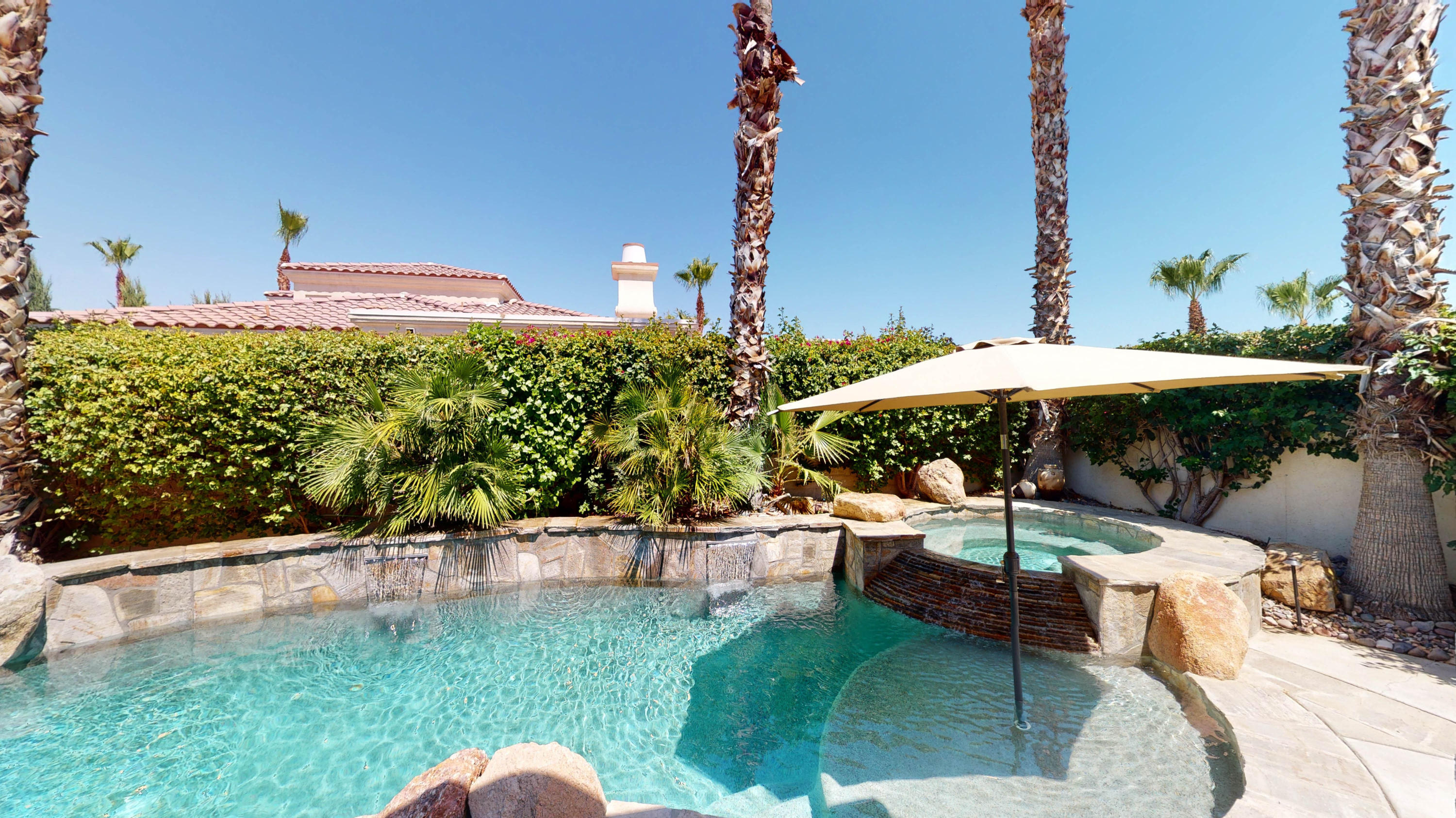 80777 Calle Azul La Quinta, CA 92253 - Photo 15 of 39 a backyard of a house with a yard and outdoor seating