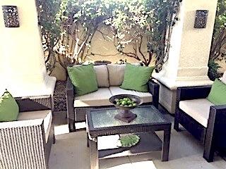80777 Calle Azul La Quinta, CA 92253 - Photo 16 of 39 a outdoor sitting area with furniture and wooden floor