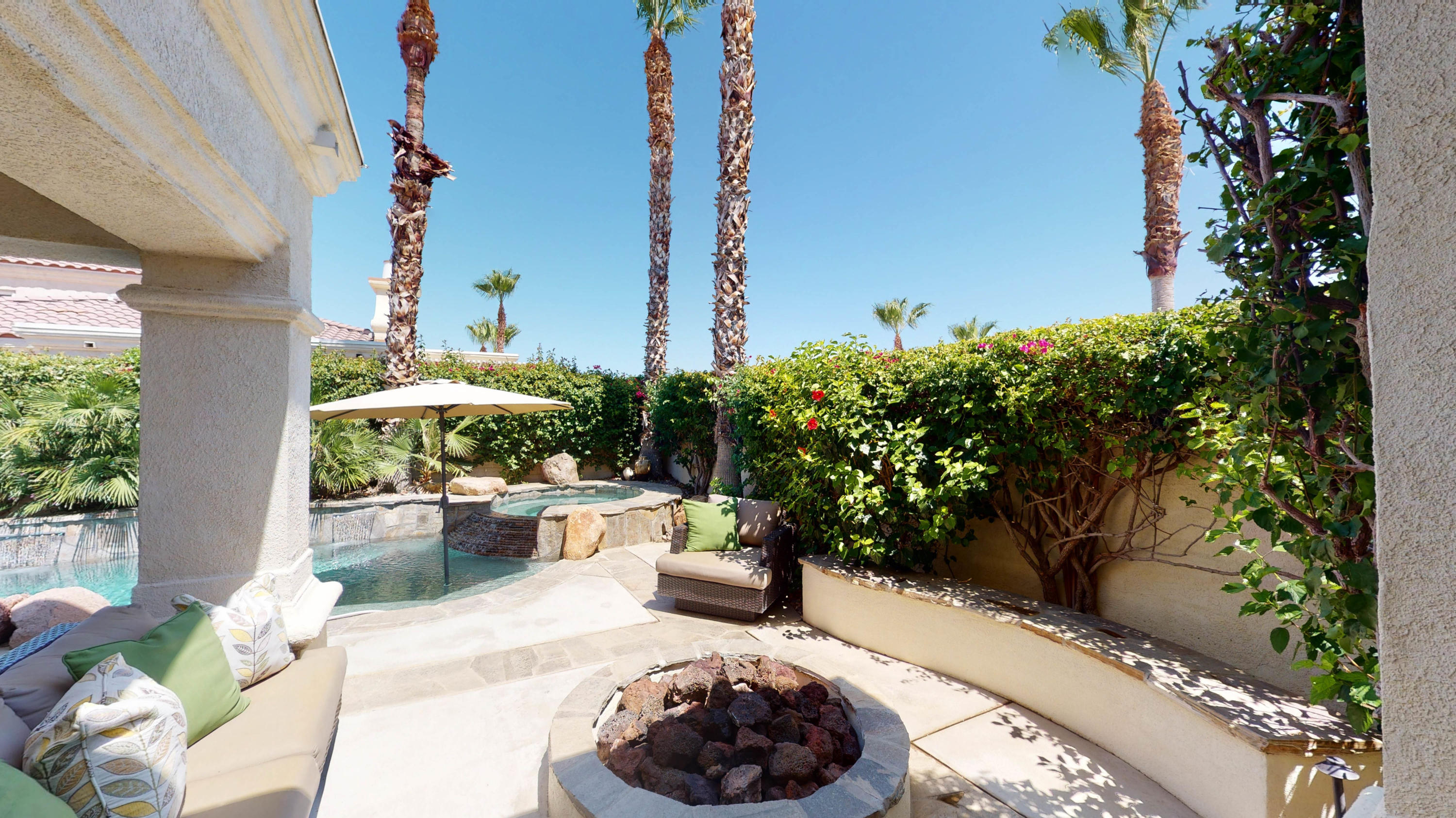 80777 Calle Azul La Quinta, CA 92253 - Photo 19 of 39 a view of a backyard with plants and outdoor seating