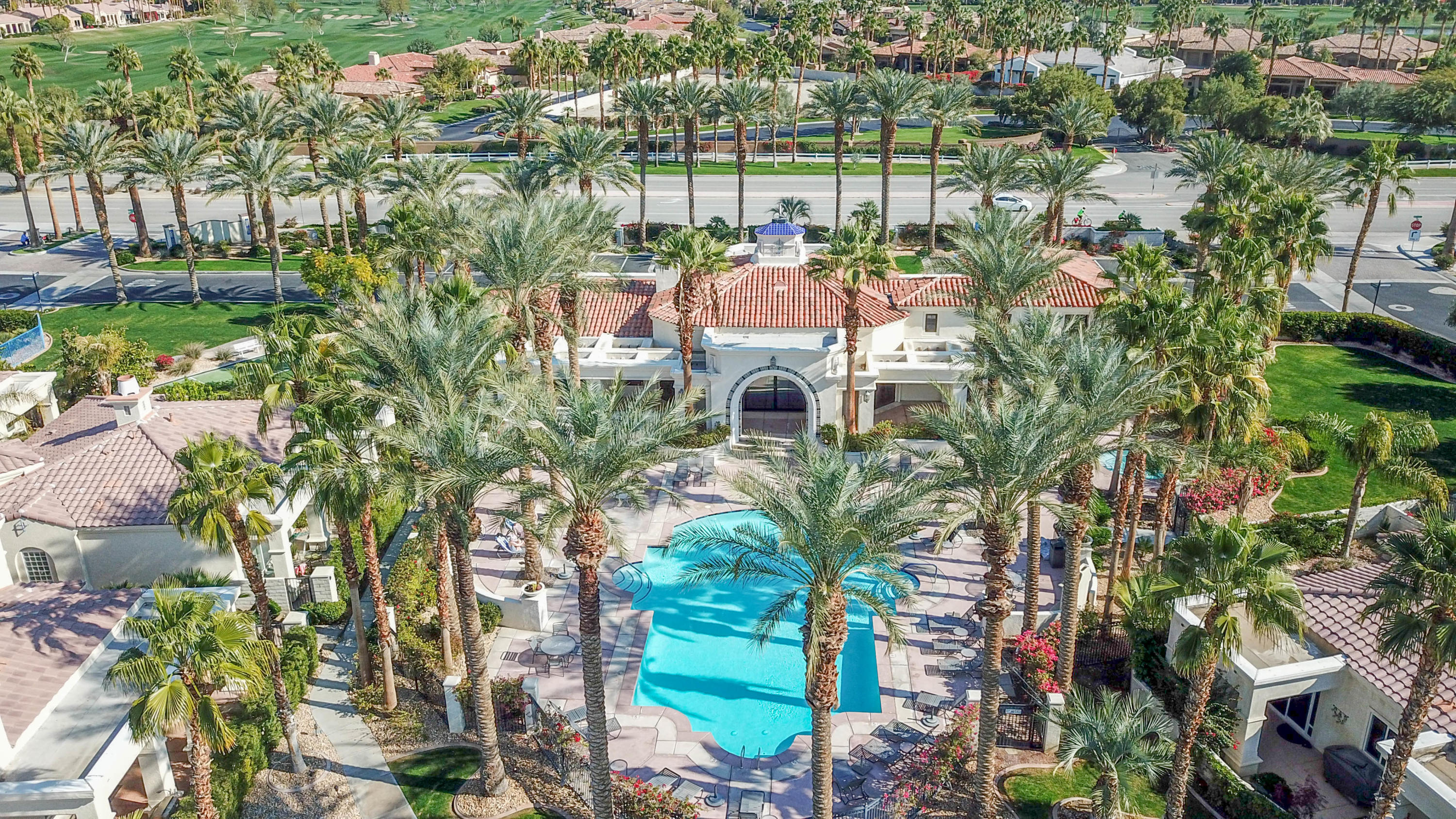 80777 Calle Azul La Quinta, CA 92253 - Photo 24 of 39 a view of a lake with a building in the background