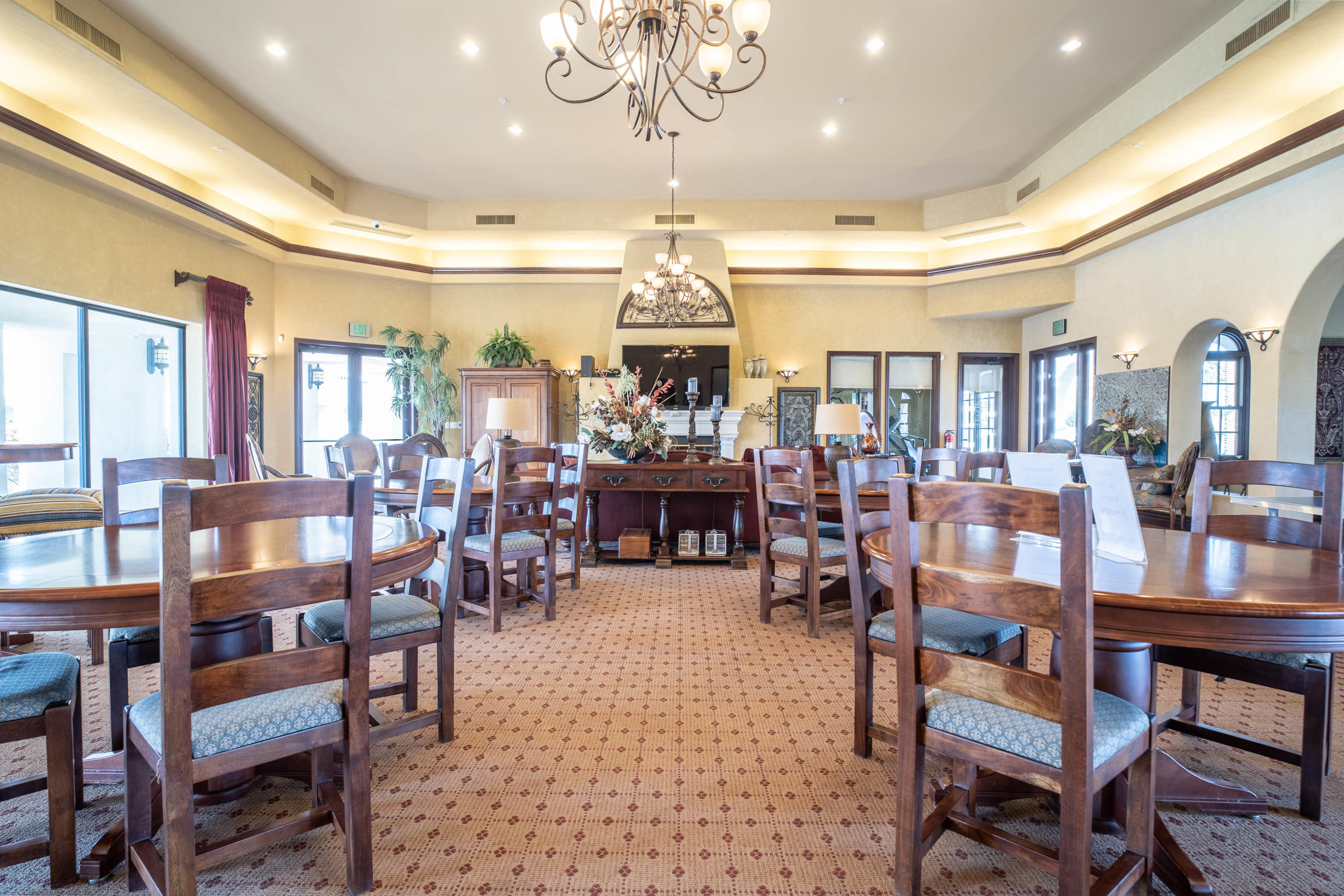 80777 Calle Azul La Quinta, CA 92253 - Photo 30 of 39 a large living room with lots of furniture and a chandelier