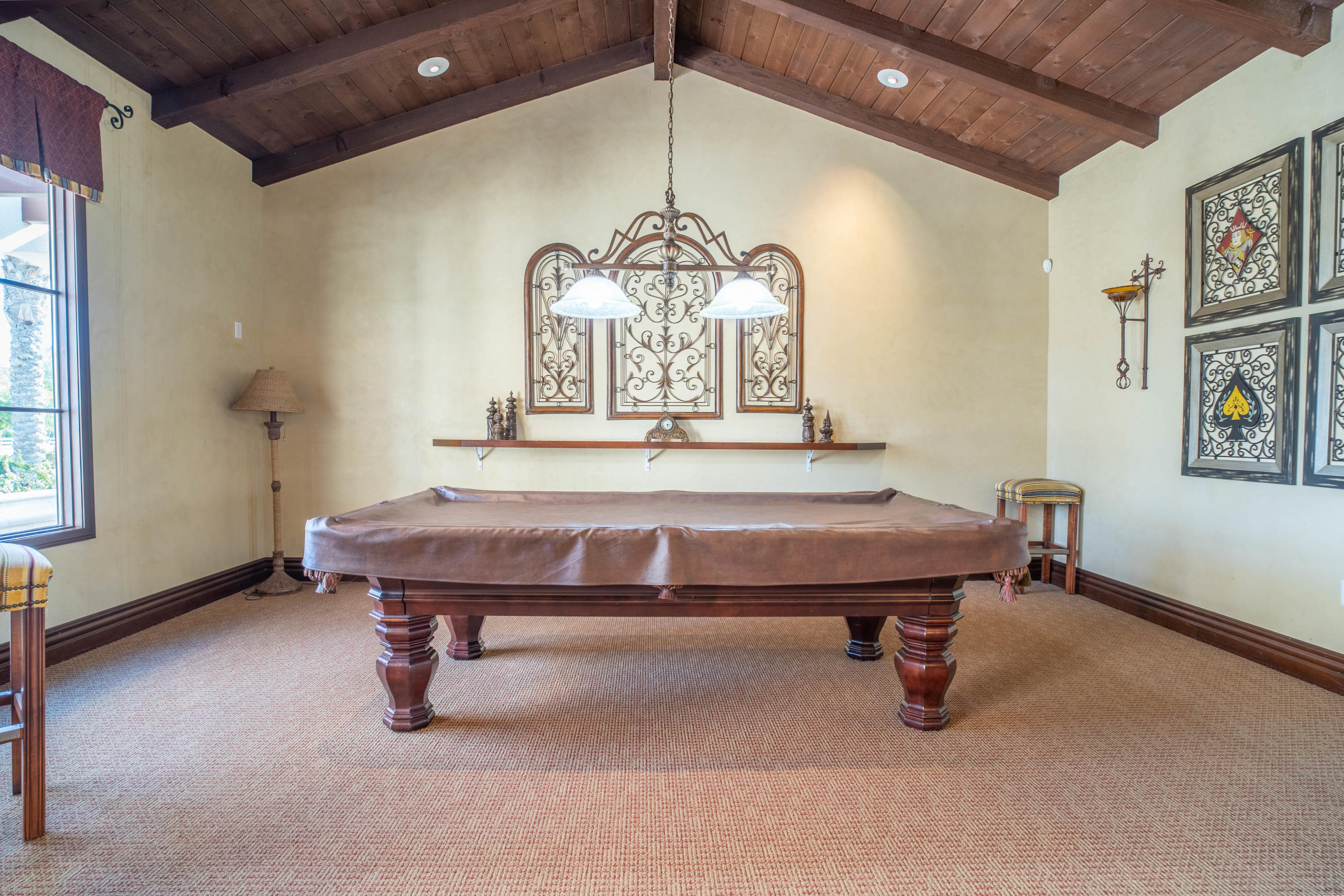 80777 Calle Azul La Quinta, CA 92253 - Photo 31 of 39 a room with a table chairs and windows