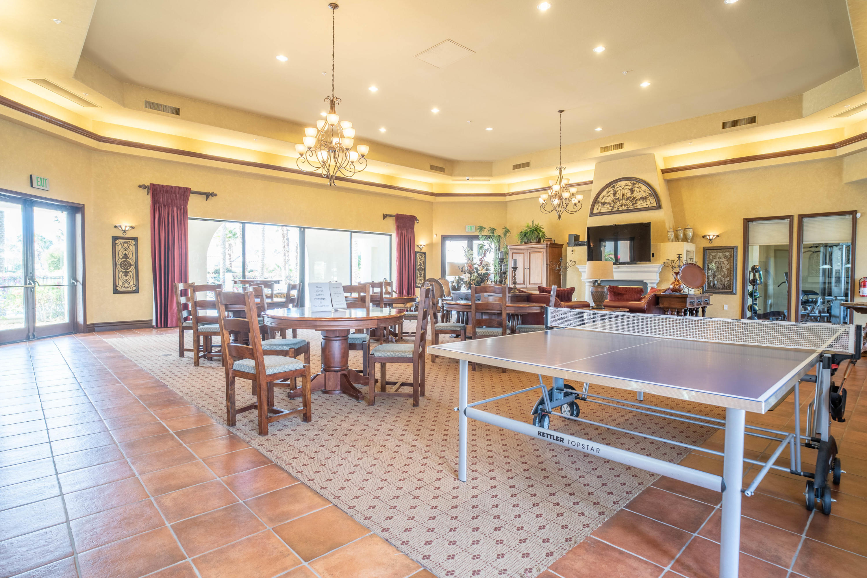 80777 Calle Azul La Quinta, CA 92253 - Photo 32 of 39 a view of a dining hall with many windows