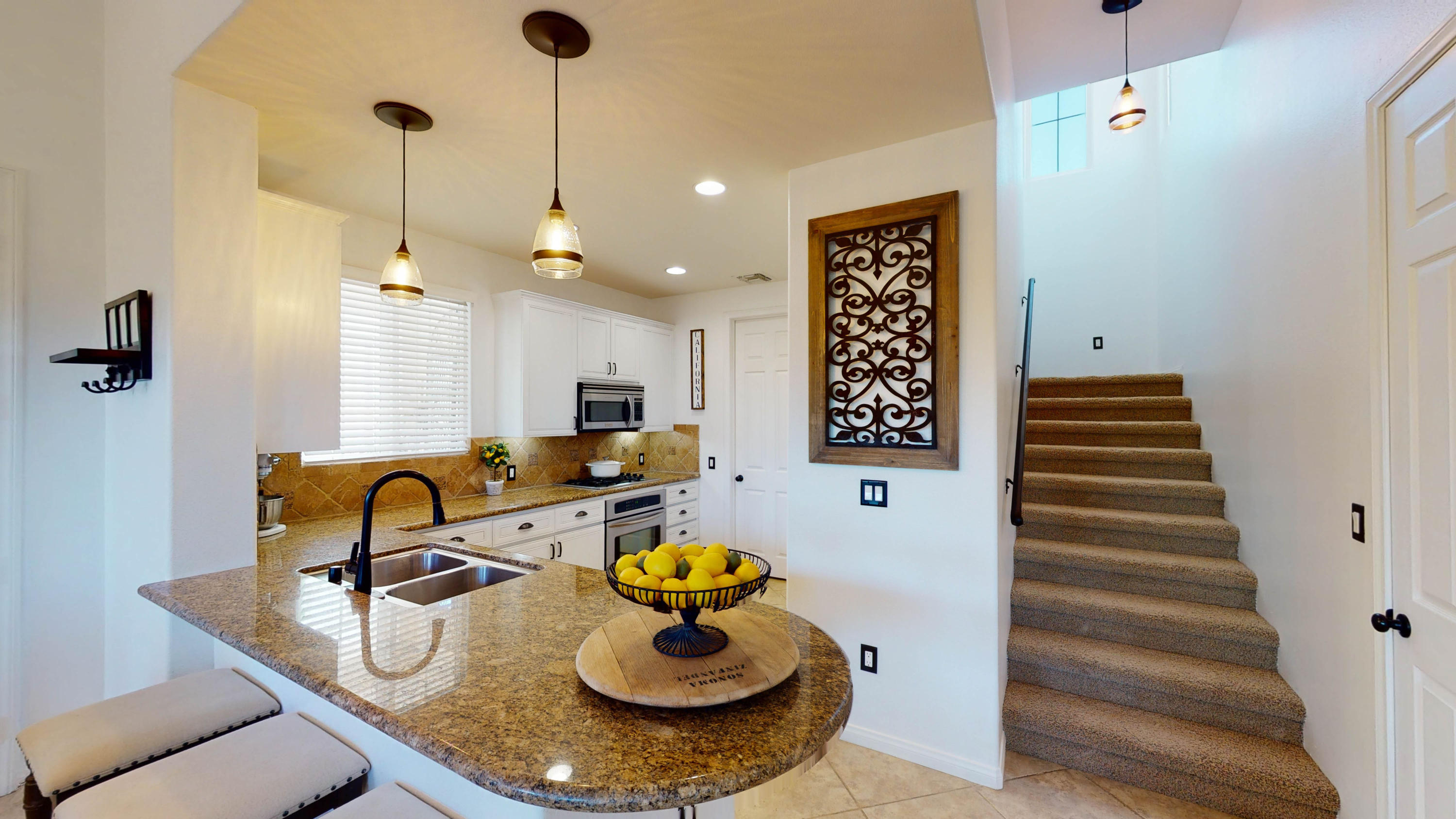 80777 Calle Azul La Quinta, CA 92253 - Photo 5 of 39 a dining room with table and chairs