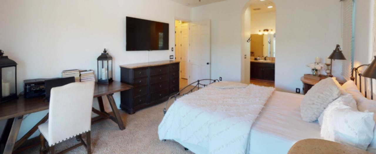 80777 Calle Azul La Quinta, CA 92253 - Photo 8 of 39 a bedroom with a bed and flat screen tv