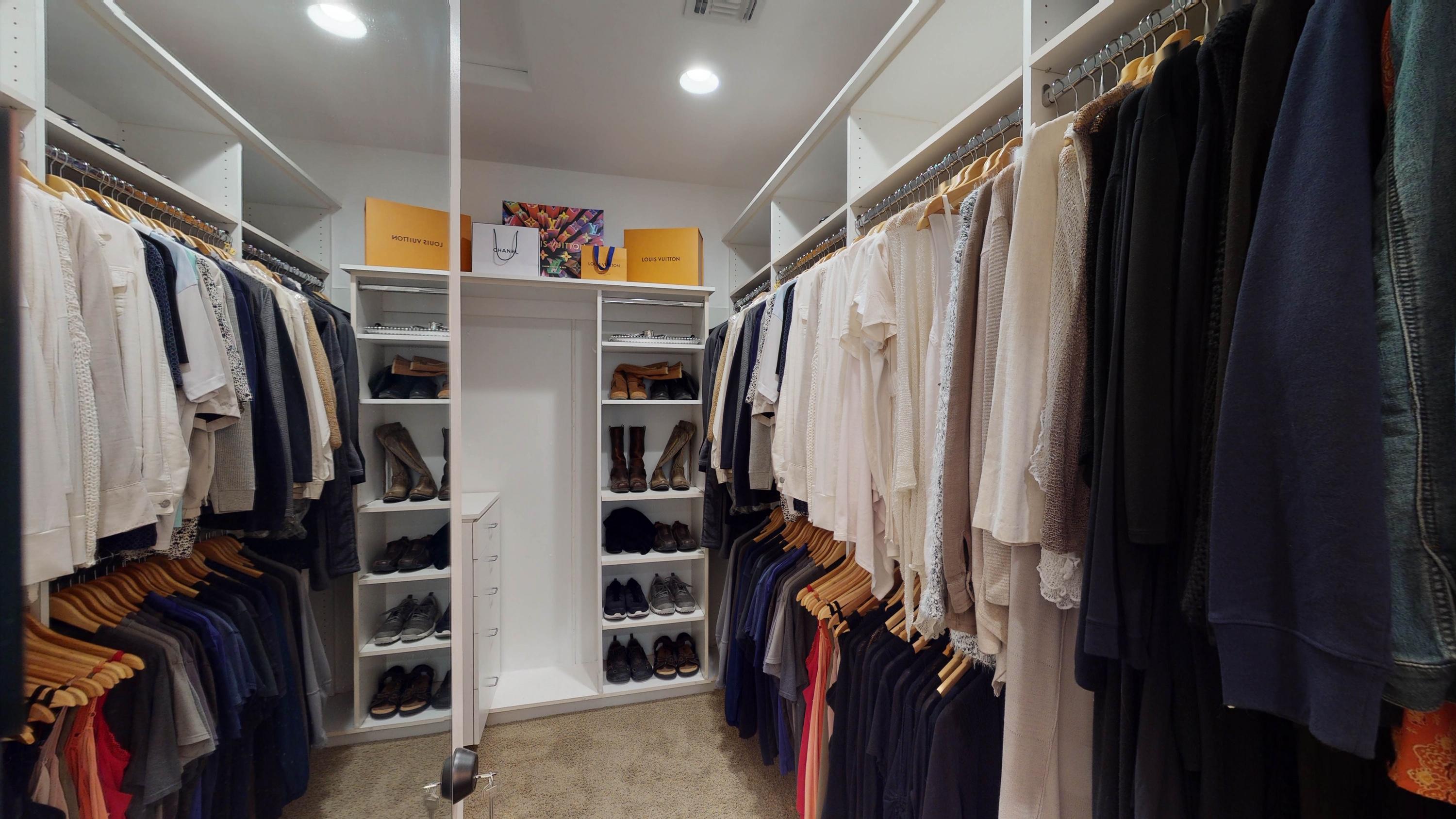 80777 Calle Azul La Quinta, CA 92253 - Photo 10 of 39 a view of walk in closet with clothes and shoes