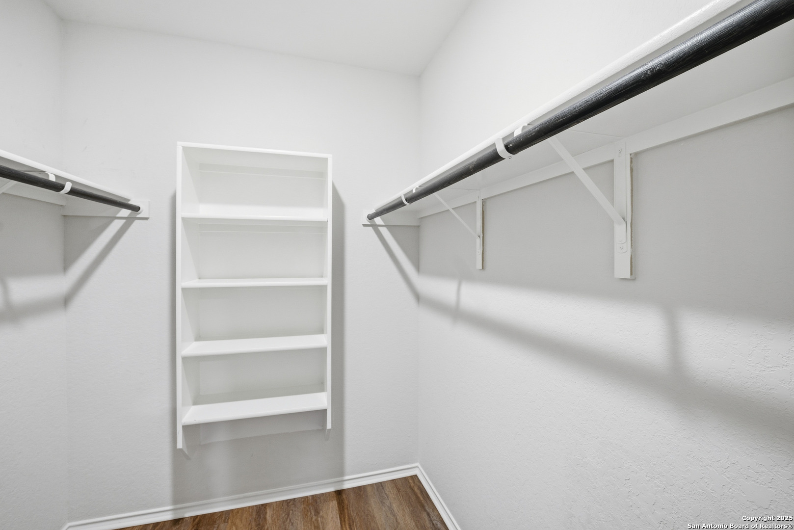 5803 Still River San Antonio, TX 78244 - Photo 7 of 15 a view of an empty walk in closet