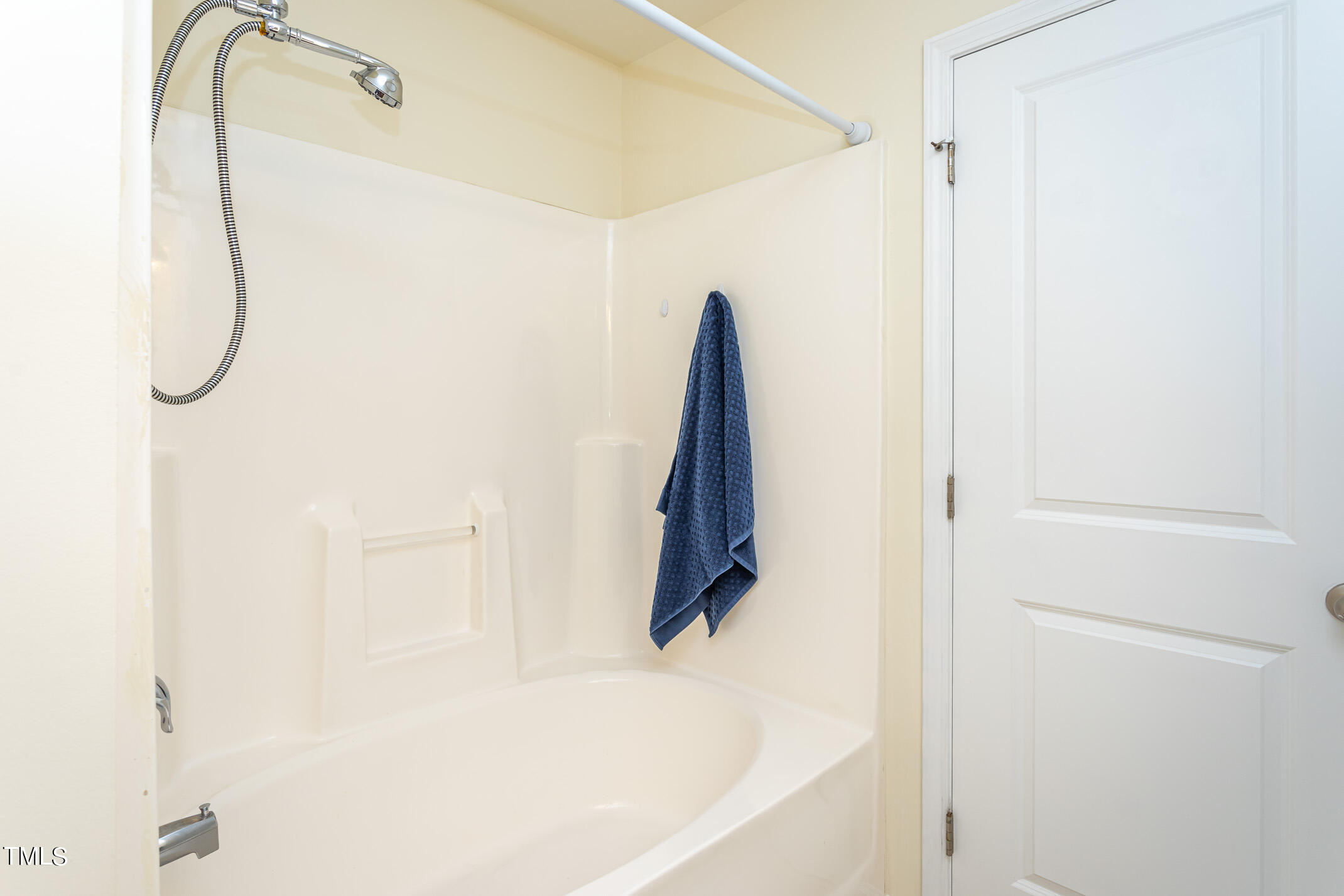 2302 Stoney Spring Drive Raleigh, NC 27610 - Photo 16 of 27 a bathroom with a shower and a shower