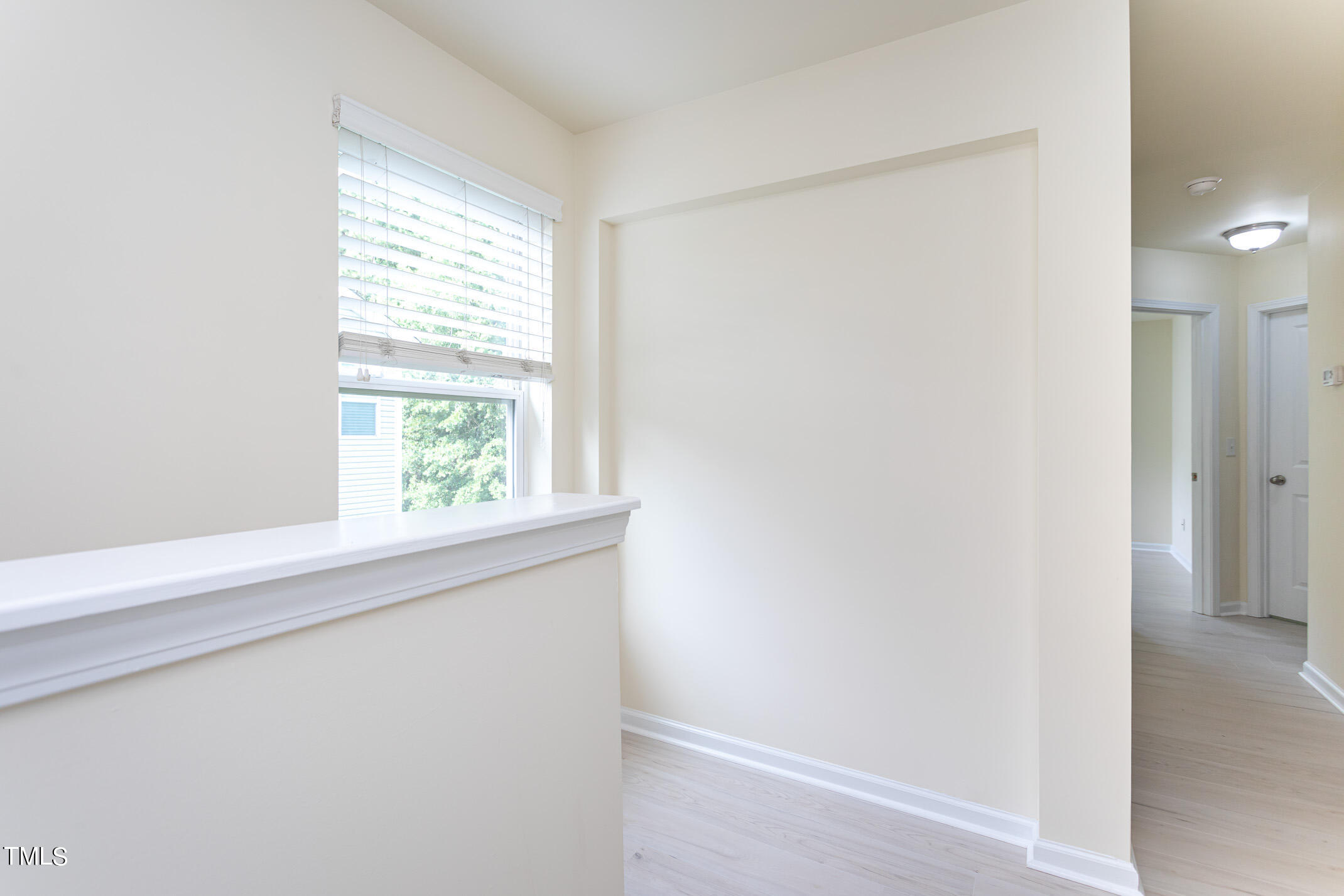 2302 Stoney Spring Drive Raleigh, NC 27610 - Photo 17 of 27 a view of a small space with a window