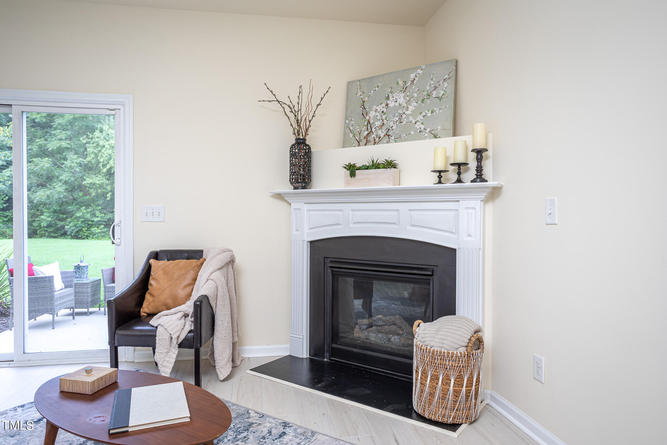 2302 Stoney Spring Drive Raleigh, NC 27610 - Photo 9 of 27 a living room with furniture and a fireplace