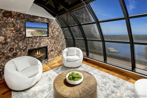a kitchen view with table and chairs