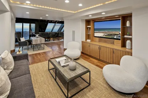 a living room with furniture and a table