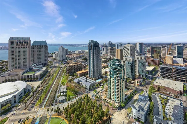 a kitchen with stainless steel appliances a stove and a microwave