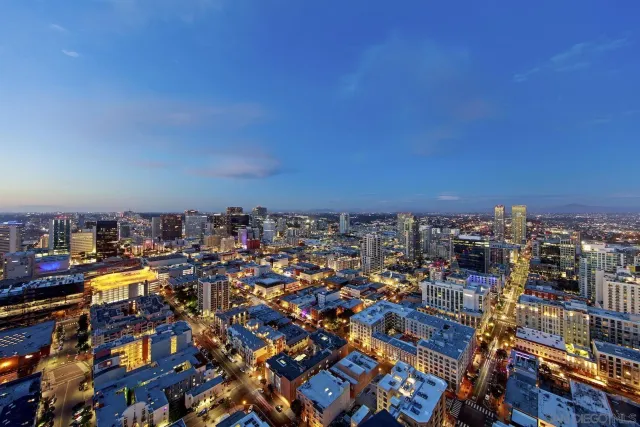 a view of a chairs and table in patio
