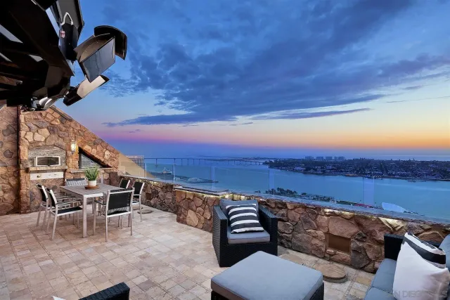 a lobby with furniture and rug