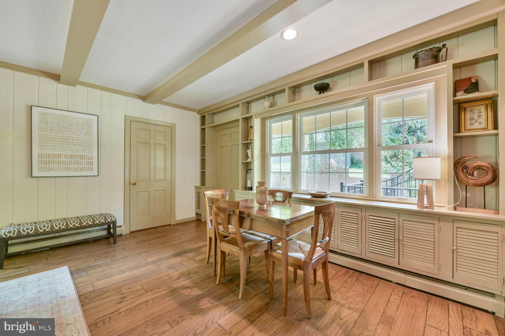 9111 Hamilton Drive Fairfax, VA 22031 - Photo 13 of 63 a dining room with furniture and wooden floor