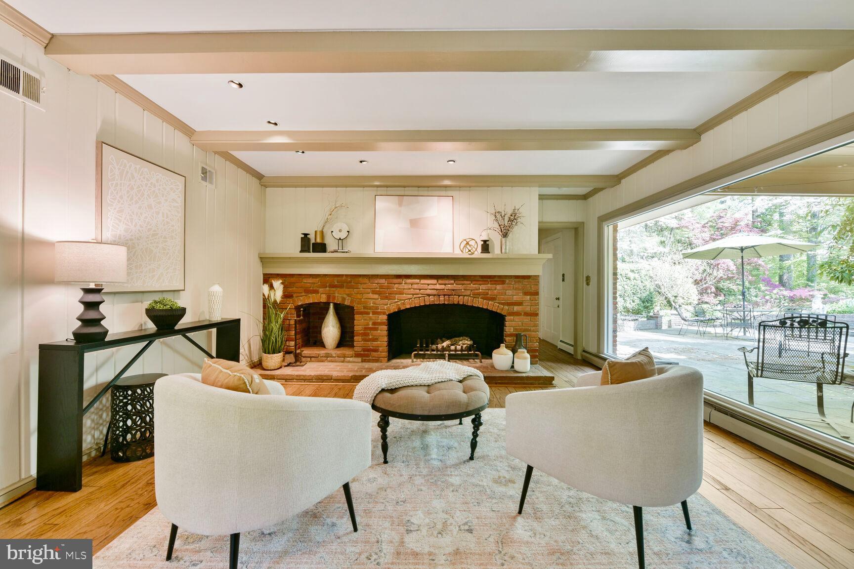 9111 Hamilton Drive Fairfax, VA 22031 - Photo 16 of 63 a living room with furniture and a fireplace