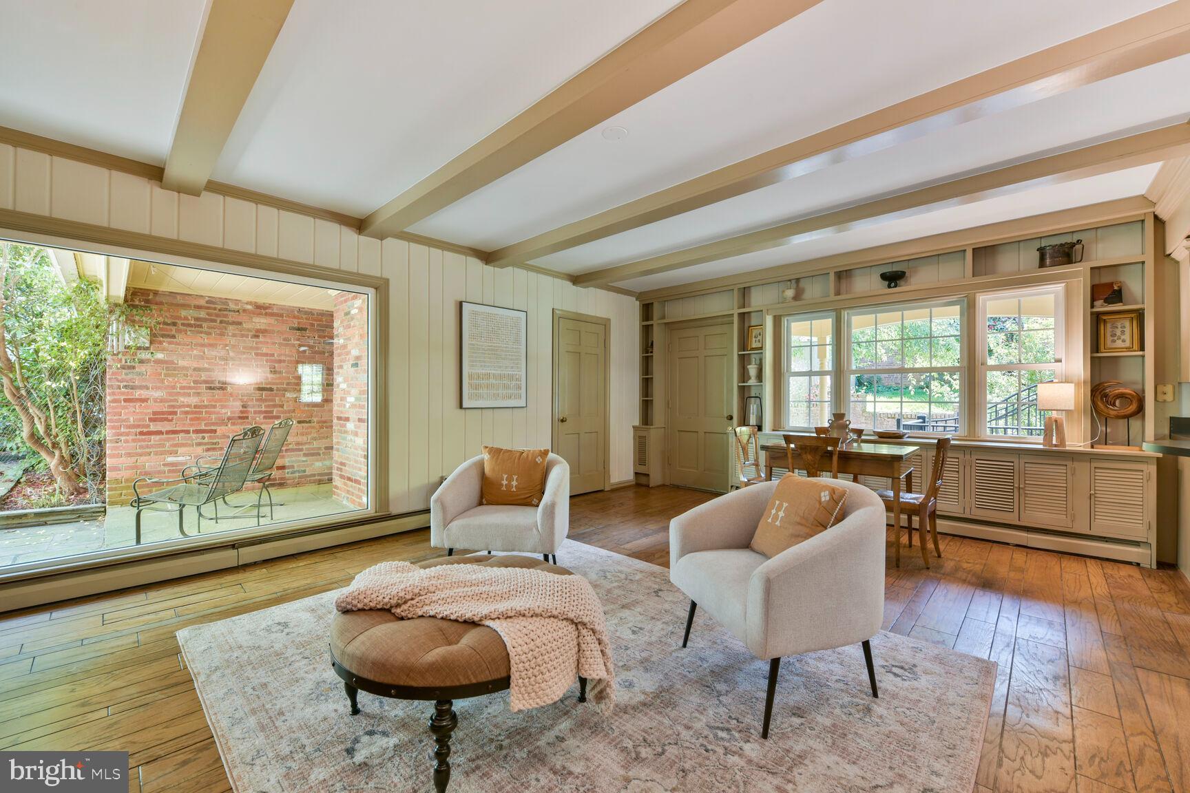 9111 Hamilton Drive Fairfax, VA 22031 - Photo 17 of 63 a living room with furniture and a large window