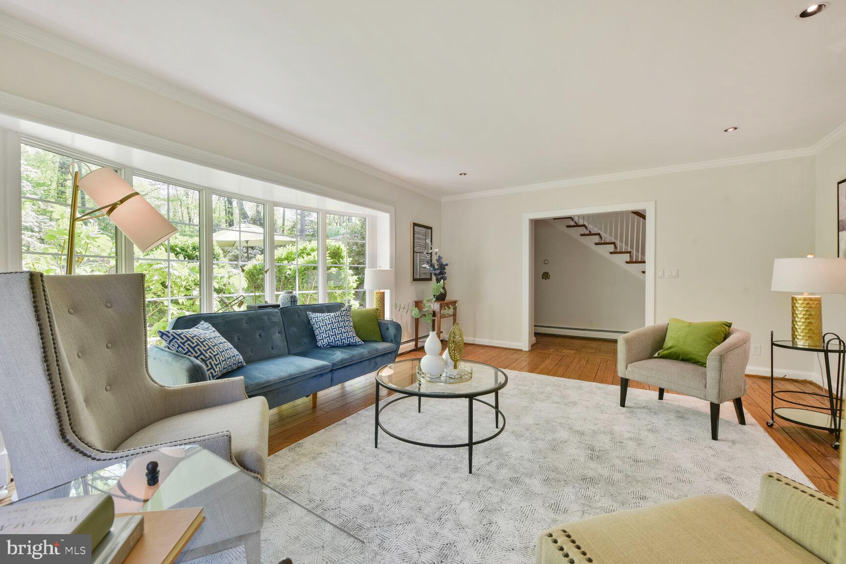 9111 Hamilton Drive Fairfax, VA 22031 - Photo 19 of 63 a living room with furniture and a large window
